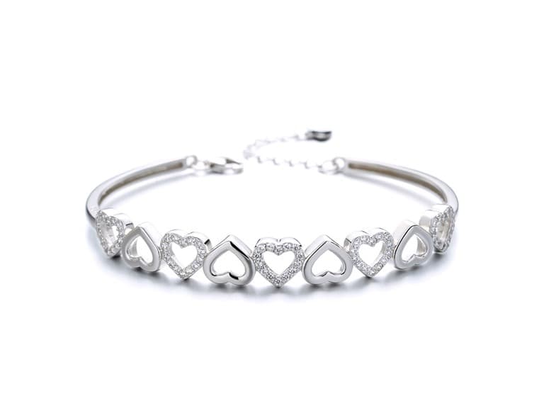 14K Gold Hearts Bangle Bracelet - Image 1